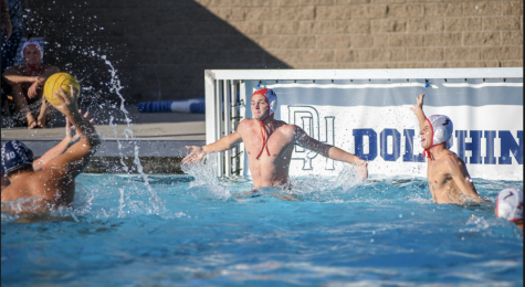 Goalie Preston Sanders blocks shot from Dana Hills attacker